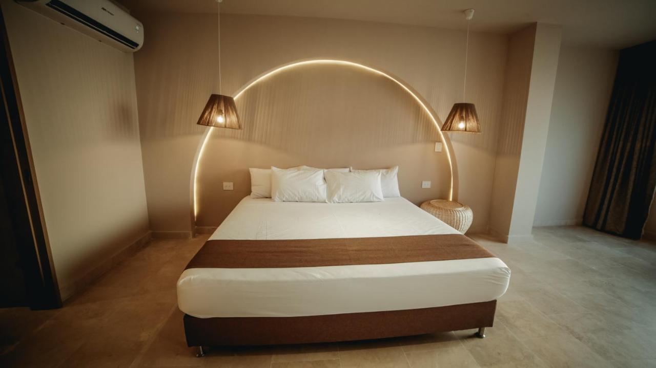 Loa Tolu By Bernalo Hotels Bagian luar foto