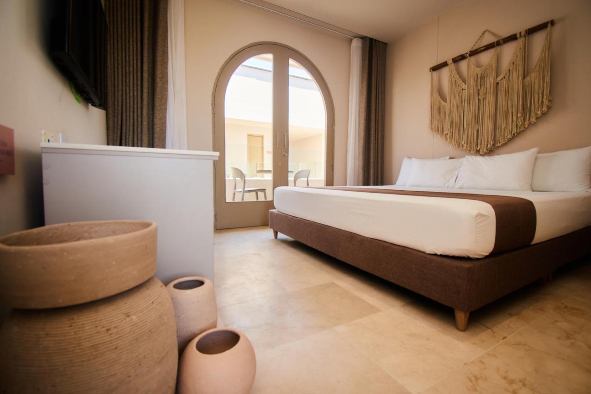 Loa Tolu By Bernalo Hotels Bagian luar foto