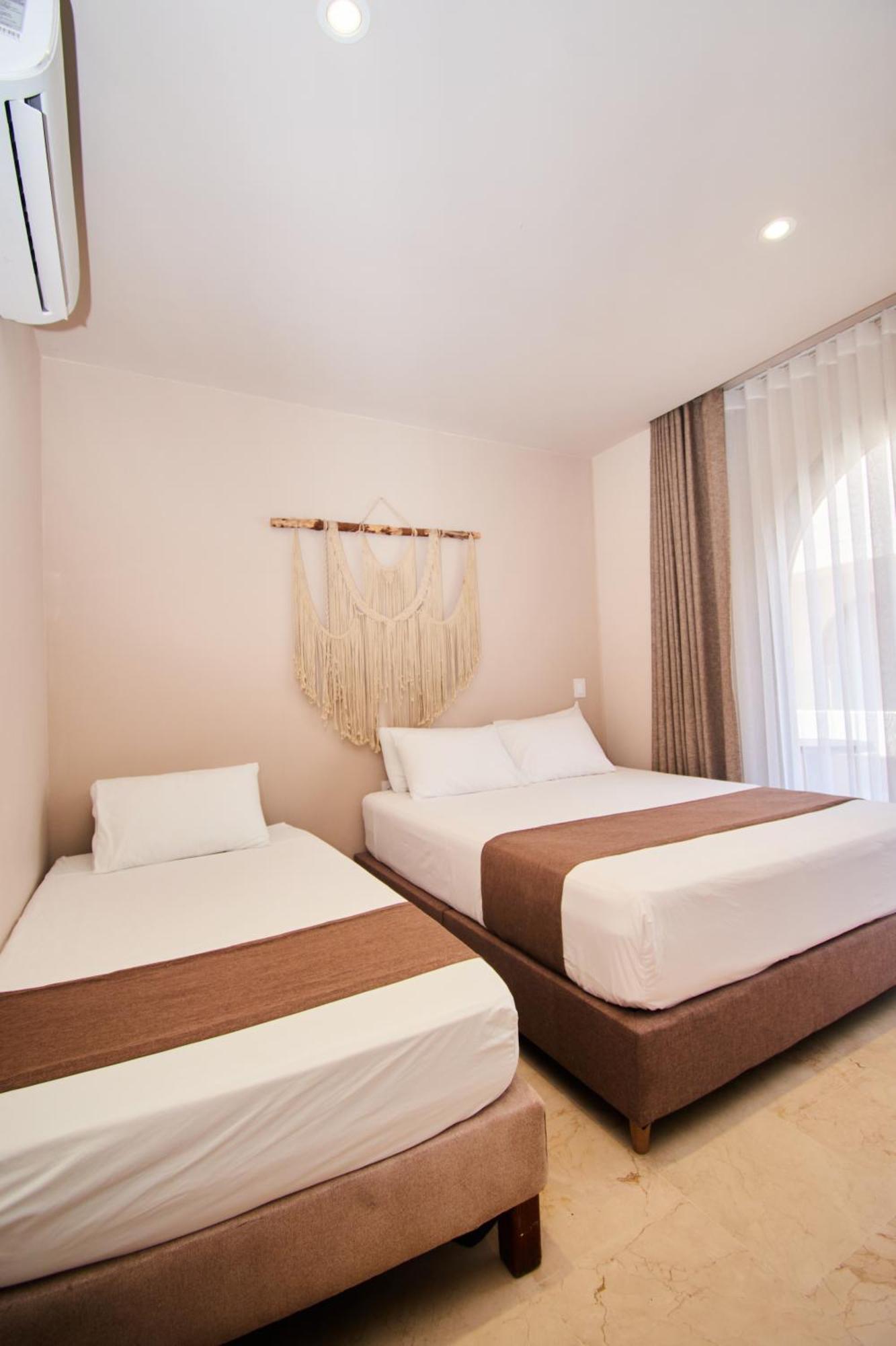 Loa Tolu By Bernalo Hotels Bagian luar foto